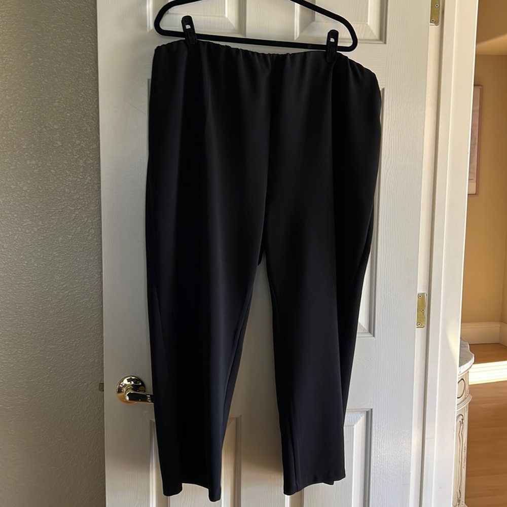 Yours Clothing Petite Woman’s ribbed pull on elastic waist pants.